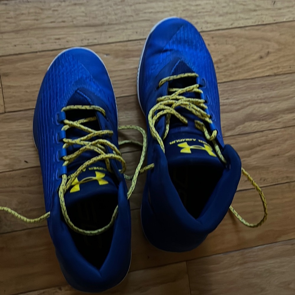 Never worn Curry basketball sneakers. Literally tried on but never worn